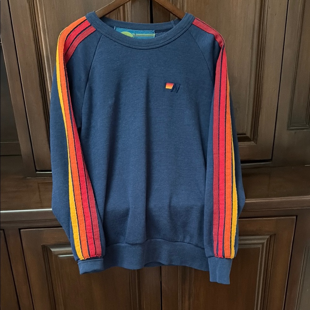 Womens Navy Crewneck Sweater with Red and Yellow Stripe Sleeves